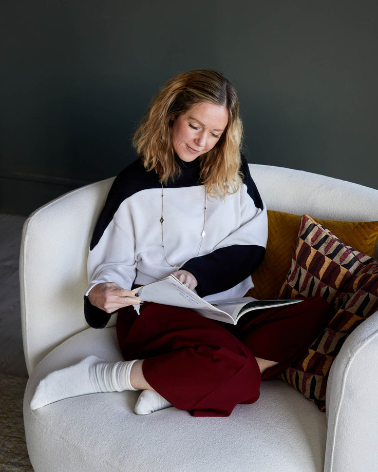 Ivory Boucle Swivel Love Seat